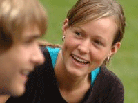 girl_smiling_in_park_200_large_large